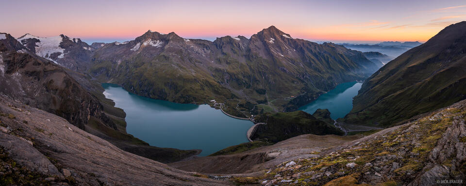 Kitzsteinhorn towers above the alpine reservoirs of Mooserboden and Wasserfallboden, as seen from the Heinrich-Schwaiger-Haus. Hohe Tauern, Austria.