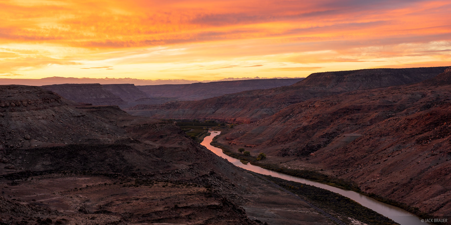 Gunnison River Sunrise A vibrant sunrise over the Gunnison River where it cuts through the Uncompahgre Plateau near the Dominguez Canyons. In the distance...